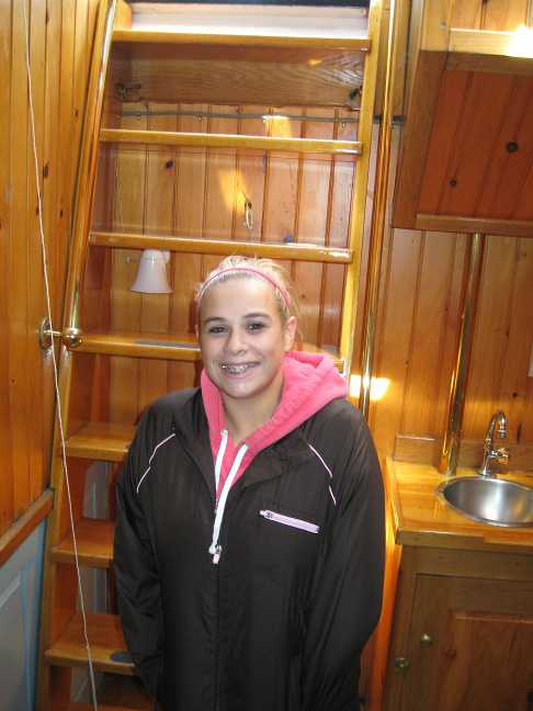 IMG_1491sm My granddaughter Coley near the ladder below deck