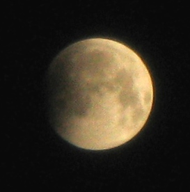 The moon 2 minutes into the partial phase of the eclipse at 1:33 a.m.