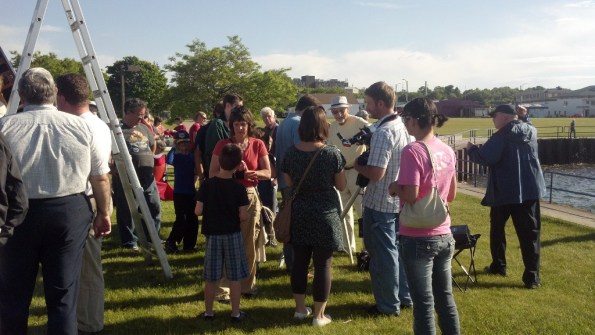 2012-06-05_18-32-20_TransitCrowd More of the Transit Crowd an Bill Renis manning our Lunt Hydrogen Alpha Solar Telescope.