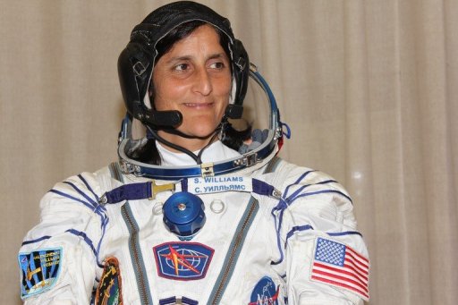 Sunita Williams in a Russian Sokol space suit prior to launch.