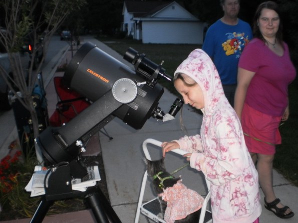 Youngster looking at a planet