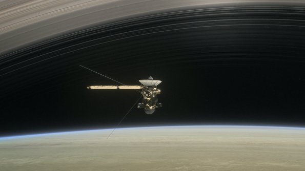 Cassini Flying between the planet and the rings.