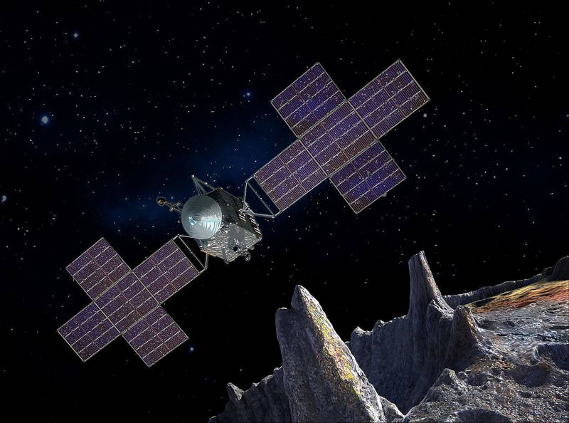 An artist's concept of the Psyche spacecraft orbiting the asteroid 16 Psyche