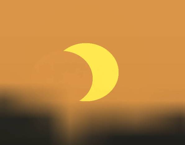 Eclipsed Sun rising