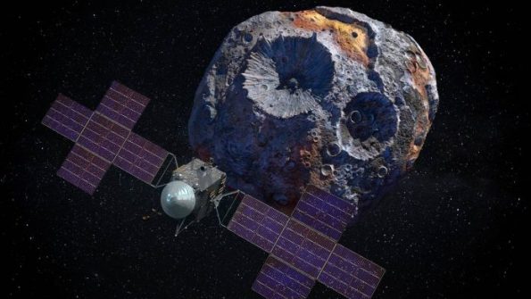 Artist's visualization of the spacecraft Psyche orbiting asteroid 16 Psyche