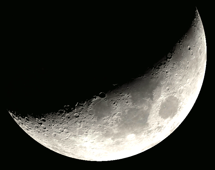 The Moon tonight about 8 pm this evening, February 14, 2024, as it might appear in binoculars or a small telescope