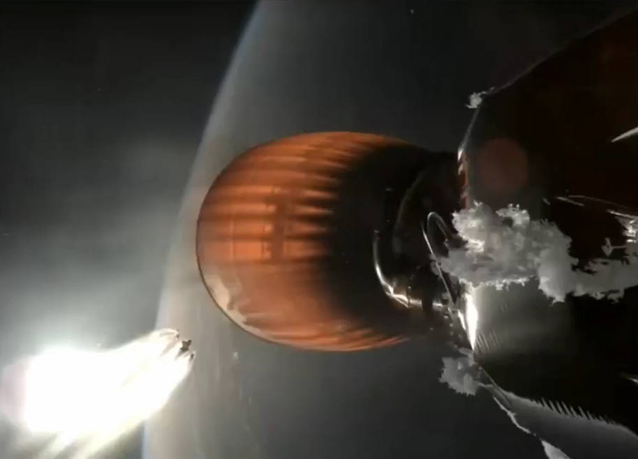 A frame of the video from one of the two cameras at the base of the second stage of the Falcon 9 rocket showing the build up of ice near the engine