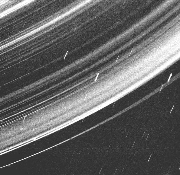 Image of a portion of a Uranian ring by the Voyager 2 spacecraft in a time exposure.